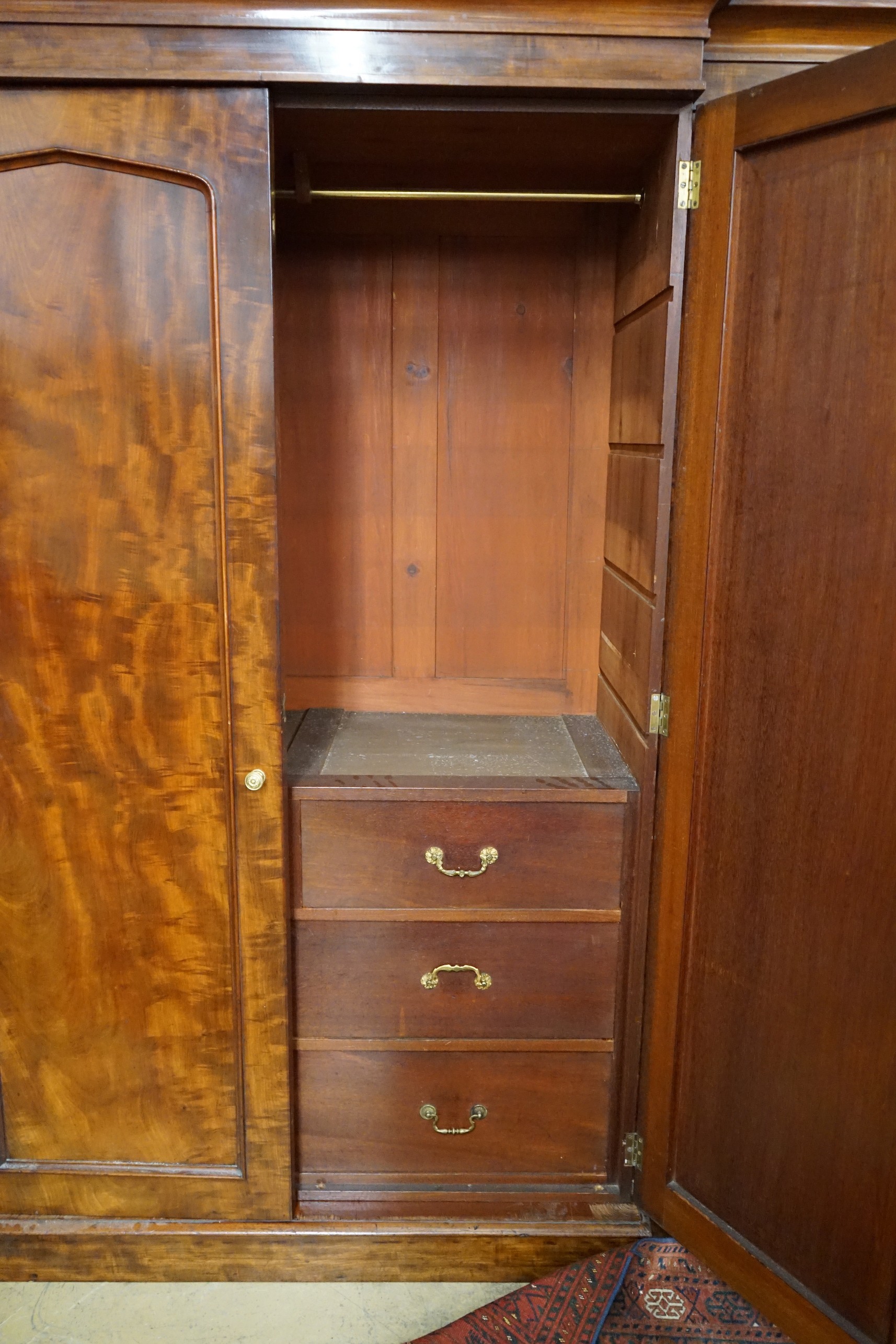 A Victorian mahogany breakfront compactum wardrobe, width 248cm, depth 69cm, height 210cm